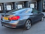 BMW 4-Serie Coupé 420i High Executive M-PAKKET SCHUIFDAK/HARMAN/KARDON/LEDER