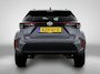 Toyota Yaris Cross 1.5 Hybrid 115 First Edition Comfort Pack | BTW voertuig | Dodehoek detectie | Stoel+stuurverwarming | Parkeersensoren voor+achter | Draadloze telefoonlader | Navigatie | Apple CarPlay/Android Auto |