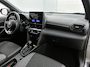 Toyota Yaris Cross 1.5 Hybrid 115 First Edition Comfort Pack | BTW voertuig | Dodehoek detectie | Stoel+stuurverwarming | Parkeersensoren voor+achter | Draadloze telefoonlader | Navigatie | Apple CarPlay/Android Auto |