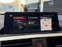 BMW 1-Serie 120i High Executive | Schuifdak | Navi | Stoelverwarming | LMV | Cruise | PDC