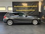 BMW 1-Serie 120i High Executive | Schuifdak | Navi | Stoelverwarming | LMV | Cruise | PDC
