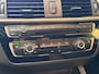 BMW 1-Serie 120i High Executive | Schuifdak | Navi | Stoelverwarming | LMV | Cruise | PDC