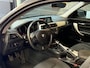 BMW 1-Serie 120i High Executive | Schuifdak | Navi | Stoelverwarming | LMV | Cruise | PDC