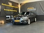 BMW 1-Serie 120i High Executive | Schuifdak | Navi | Stoelverwarming | LMV | Cruise | PDC