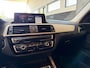 BMW 1-Serie 120i High Executive | Schuifdak | Navi | Stoelverwarming | LMV | Cruise | PDC