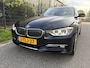 BMW 3-Serie Touring 316i High Executive / AUTOMAAT / NAVI / LEER / CRUISE / TREKHAAK