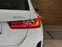 BMW 3-Serie Touring 330e M-Sport | xDrive |Shadowline | Elektrische Sporstoelen | 19” | Driving Assistant Professional | Head-Up