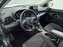 Toyota Yaris 1.5 Hybrid 115 Dynamic | Dodehoek detectie | Parkeersensoren voor/achter | Stoel-/stuurverwarming | Apple Carplay / Android Auto | Keyless | Adaptive Cruise | Clima | Camera | 16 inch