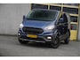 Ford Transit Custom 300 2.0 TDCI L1H1 Trail BJ2022 Lmv 16" (Zwart) | Led | Pdc | Trekhaak | Verwarmde voorruit | Achteruitrijcamera | Navi | Airco | Cruise control | Lederen bekleding | Verwarmde voorstoelen | Tussenschot | Achterdeuren | Zijdeur | Bijrijdersbank|3 Persoons