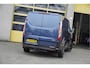 Ford Transit Custom 300 2.0 TDCI L1H1 Trail BJ2022 Lmv 16" (Zwart) | Led | Pdc | Trekhaak | Verwarmde voorruit | Achteruitrijcamera | Navi | Airco | Cruise control | Lederen bekleding | Verwarmde voorstoelen | Tussenschot | Achterdeuren | Zijdeur | Bijrijdersbank|3 Persoons