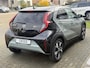 Toyota Aygo X 1.5 Hybrid Pulse Plus | Tarragon, Bi-Tone, Stoelverwarming, Climate control, Startknop, LED, 17 inch