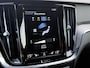 Volvo V60 2.0 T6 Recharge 350pk AWD R-Design Plus Dark | Long range | Trekhaak wegklapbaar | Pilot assist | Adaptieve cruise | Stoelverwarming | Camera | Sportstoelen half leder met memory | 19 inch velgen | Navigatie | Apple CarPlay | DAB | Keyless | Full-LED | Sfeerverlichting | Elektrische achterklep | Recent onderhouden