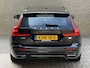Volvo V60 2.0 T6 Recharge 350pk AWD R-Design Plus Dark | Long range | Trekhaak wegklapbaar | Pilot assist | Adaptieve cruise | Stoelverwarming | Camera | Sportstoelen half leder met memory | 19 inch velgen | Navigatie | Apple CarPlay | DAB | Keyless | Full-LED | Sfeerverlichting | Elektrische achterklep | Recent onderhouden