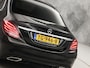 Mercedes-Benz C-klasse 180 AMG Sport 156Pk Automaat (NAVIGATIE, CAMERA, LEDER, ZWART HEMEL, STOELVERWARMING, SPORTSTOELEN, GETINT GLAS, NIEUWSTAAT)