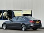 BMW 3-Serie 328i 245PK l Harman/Kardon l Head-up l Leer l