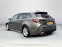 Toyota Corolla TS 1.8 Hybrid Style | Rijklaarprijs | Stoel- stuurverwarming | Navigatiesysteem | Parkeersensoren voor- en achter | Adaptieve Cruise Control | Climate Control | All Seasonbanden | Automaat |