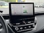 Toyota Corolla TS 1.8 Hybrid Style | Rijklaarprijs | Stoel- stuurverwarming | Navigatiesysteem | Parkeersensoren voor- en achter | Adaptieve Cruise Control | Climate Control | All Seasonbanden | Automaat |