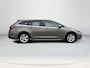 Toyota Corolla TS 1.8 Hybrid Style | Rijklaarprijs | Stoel- stuurverwarming | Navigatiesysteem | Parkeersensoren voor- en achter | Adaptieve Cruise Control | Climate Control | All Seasonbanden | Automaat |