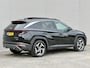 Hyundai Tucson 1.6 T-GDI PHEV Comfort Smart Sky 4WD / Dealer Onderhouden / SOH 100% / Panoramadak / Adaptief Cruise Control / Navigatie / Achteruitrijcamera / Apple Carplay & Android Auto / Stoel & Stuurverwarming / 19" LM Velgen / Elektrische Achterklep /