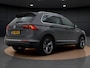 Volkswagen Tiguan 1.4 TSI Highline | Leder | Navigatie | ACC | 19" | Elek Stoel | Stoelverwarming |