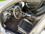 BMW 1-Serie M135i High Executive / AUTOMAAT / SCHUIFDAK / LEER / NAVI / HARMAN KARDON
