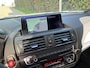BMW 1-Serie M135i High Executive / AUTOMAAT / SCHUIFDAK / LEER / NAVI / HARMAN KARDON