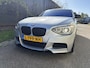 BMW 1-Serie M135i High Executive / AUTOMAAT / SCHUIFDAK / LEER / NAVI / HARMAN KARDON