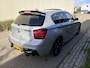 BMW 1-Serie M135i High Executive / AUTOMAAT / SCHUIFDAK / LEER / NAVI / HARMAN KARDON