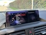 BMW 1-Serie M135i High Executive / AUTOMAAT / SCHUIFDAK / LEER / NAVI / HARMAN KARDON