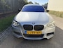 BMW 1-Serie M135i High Executive / AUTOMAAT / SCHUIFDAK / LEER / NAVI / HARMAN KARDON