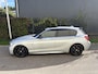 BMW 1-Serie M135i High Executive / AUTOMAAT / SCHUIFDAK / LEER / NAVI / HARMAN KARDON
