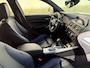 BMW 1-Serie M135i High Executive / AUTOMAAT / SCHUIFDAK / LEER / NAVI / HARMAN KARDON