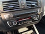 BMW 1-Serie M135i High Executive / AUTOMAAT / SCHUIFDAK / LEER / NAVI / HARMAN KARDON