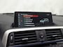 BMW 1-Serie 118i M Sport High Executive Automaat (GROOT NAVI, M PAKKET, MEMORY SEAT, LEDER, STOELVERWARMING, SPORTSTOELEN, FLIPPERS, GETINT GLAS, NIEUWSTAAT)