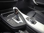 BMW 1-Serie 118i M Sport High Executive Automaat (GROOT NAVI, M PAKKET, MEMORY SEAT, LEDER, STOELVERWARMING, SPORTSTOELEN, FLIPPERS, GETINT GLAS, NIEUWSTAAT)