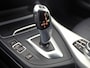 BMW 1-Serie 118i M Sport High Executive Automaat (GROOT NAVI, M PAKKET, MEMORY SEAT, LEDER, STOELVERWARMING, SPORTSTOELEN, FLIPPERS, GETINT GLAS, NIEUWSTAAT)