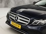 Mercedes-Benz E-klasse 200 Prestige Sport 184Pk Automaat (NAVIGATIE, SFEERVERLICHTING, CAMERA, LEDER, SPORTSTOELEN, GETINT GLAS, STOELVERWARMING, CRUISE, NIEUWSTAAT)