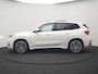 BMW iX1 xDrive30 M Sport 313pk Dealer O.H. | Trekhaak Af Fabriek | Panodak | 360 Camera | Head Up | Lederen Sportstoelen Memory & Verwarmd | Stuur Verwarmd | Keyless | Sfeerverlichting | Apple Carplay | Navigatie | DAB | 20"L.M
