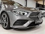 Mercedes-Benz CLA 180 AMG | Pano | Stoelverwarming | Sfeer | Night | 18" | LED HP | NAP | Camera | Leer | Verkeerslichtweergave+ | Widescreen | DYNAMIC