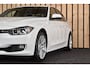 BMW 3-Serie 320i Upgrade Edition 184 PK Automaat NL-auto Xenon Leer Clima Cruise + Nwe APK