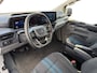 Ford E-Transit Cust. 320 L2H1 Sport 65 kWh | NL auto | Automaat | Winter pack | Adaptief cruise control | BLIS | Elektr. trekhaak | Parkeersensor voor en achter | Achteruitrijcamera | 19" lichtmetalen velgen |