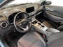 Hyundai Kona Electric EV Fashion 64 kWh 204PK | Warmtepomp | Navigatie | Apple Carplay & Android Auto | 100% SOH | Adaptive cruise control | Climate control | Head-up display | Parkeersensoren achter |