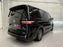 Volkswagen Multivan 1.4 eHybrid L2 Life 7p. MASSAGE/TREKHAAK/ACC/ADAPTIVE-ONDERSTEL/H&K/HEAD-UP/LEER-ALCANTARA/SFEER/IQ-LIGHT/CAMERA/ELECTR.SCHUIFDEUREN/PDC+AUT.PARKEREN/EL.A.KLEP/UNIEK SLECHTS 34.000KM