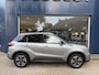 Suzuki Vitara 1.4 Boosterjet Style Smart Hybrid | Automaat | Eerste eigenaars auto | Afneembare trekhaak 1500KG | All season banden | Navigatie | Stoelverwarming | Hoge zitpositie | Lichtmetaal | Cruise control | Climate control | Two tone