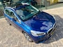 BMW 2-Serie Active Tourer 218i Centennial High Executive, NAP, PANO, Trekhaak, Leder