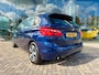 BMW 2-Serie Active Tourer 218i Centennial High Executive, NAP, PANO, Trekhaak, Leder