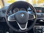BMW 2-Serie Active Tourer 218i Centennial High Executive, NAP, PANO, Trekhaak, Leder