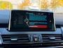 BMW 2-Serie Active Tourer 218i Centennial High Executive, NAP, PANO, Trekhaak, Leder