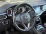 Opel Astra Sports Tourer 1.0 Innovation ✓1e Eigenaar✓Camera✓Trekhaak✓Carplay✓Navi✓Halfleder✓105pk✓Pdc V+A✓Recent beurt gehad✓Clima✓Cruise✓Rijstrooksensor✓N.A.P✓Apk tot 10-2027