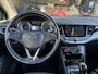 Opel Astra Sports Tourer 1.0 Innovation ✓1e Eigenaar✓Camera✓Trekhaak✓Carplay✓Navi✓Halfleder✓105pk✓Pdc V+A✓Recent beurt gehad✓Clima✓Cruise✓Rijstrooksensor✓N.A.P✓Apk tot 10-2027